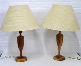 A pair of wooden table lamp bases with shades, (2)