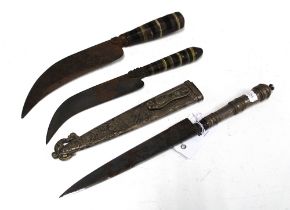 Hunting knife in a white metal sheaf with deer, boar and rabbit together with two other knives