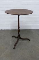 Mahogany pedestal wine table, the oval top on a slender column with splayed legs, 51 x 63 x 40cm.