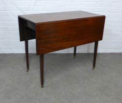 19th century mahogany drop leaf table, on square tapering legs terminating on brass ccaps and