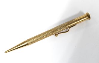 9ct gold 'The Mascot' propelling pencil, engine turned case, Birmingham 1948, 12cm long