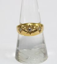 An Edwardian 18ct gold three stone diamond Gypsy ring, Chester 1907