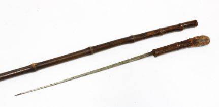 An early 20th century Japanese bamboo short sword stick, overall length 90cm, dagger 44cm