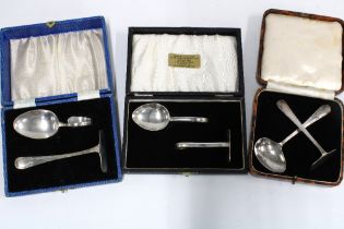 Birmingham silver pusher set in a fitted case and two Epns pusher sets (3)