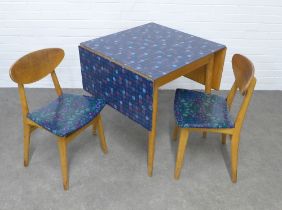 Kandya retro Formica topped table and two chairs, 135 x 75 x 68cm. (3)