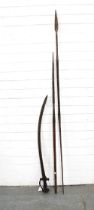 Barbed spear and another together with a sword with curved blade (3)