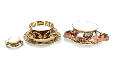 Royal Crown Imari porcelain cup, saucer and side plate trio together with a Royal Crown Derby
