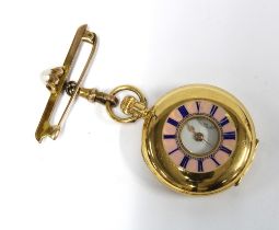 Lady's 18ct gold half hunter fob watch, the cover with a pink enamel chapter ring with blue roman