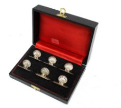 A set of six silver shell menu card holders, stamped 925, in fitted box (6)
