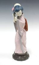 Lladro Chrysanthemum figure, No.4990, 29cm.