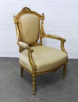 Giltwood fauteuil with upholstered back, arms and seat, (some losses to the gilt) 68 x 102 x 52cm.