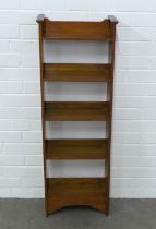 Arts & Crafts oak open bookcase, narrow proportions, 38 x 112 x 17cm.