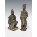 Two Terracotta Army figures, one modelled standing the other kneeling, (2) 28cm high.