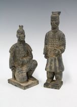 Two Terracotta Army figures, one modelled standing the other kneeling, (2) 28cm high.