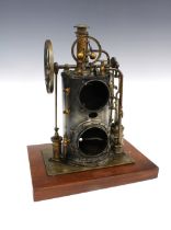 French model steam pump on wooden plinth base, 35cm