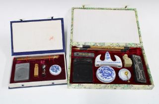 Two chinoiserie boxed calligraphy sets, larger 29 x 19cm (2)