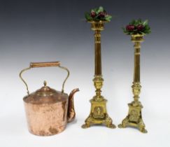 Pair of brass candle holders, with faux cherries, taller 46cm, together with a copper kettle (3)