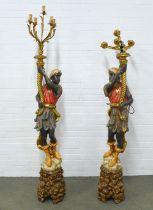 Pair of 20th century Blackamoor floor standing lamps, polychrome painted with gilt metal five branch