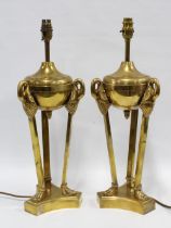 A pair of Empire style brass tripod table lamps, with swan heads and paw feet, 52cm (2)