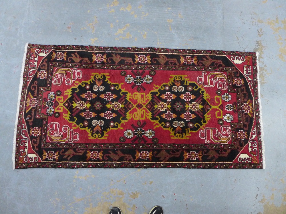 Persian rug, red field with two medallions and Rug with red field and flowerhead border, 202 x