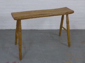 EDWARD RUSHWORTH handcrafted oak bench, serpentine plank top on turned legs, underside signed with