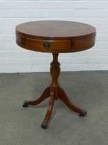 Cherrywood drum table, of small size, 49 x 60cm.