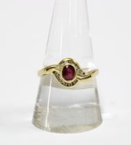 18ct gold ruby and diamond crossover dress ring