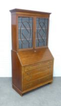 Mahogany and chequerband strung bureau bookcase cabinet, cornice over a pair of glazed doors with
