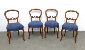 Set of four walnut balloon back chairs with carved central splat, blue upholstered stuffover