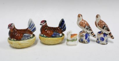 Two small Staffordshire hen on nests, a swan and two birds, (4) (a/f) tallest 10cm