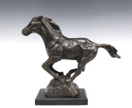 Bronze patinated metal model of a horse, 34 x 40cm