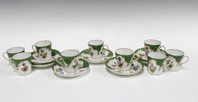 Dresden porcelain coffee can cups and saucers, green scale borders with floral sprays, (16)