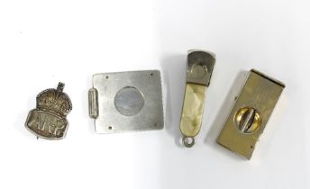 Three cigar cutters and an ARP badge (4)