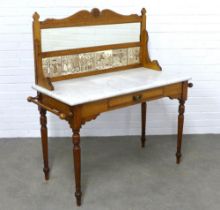 Late 19th / early 20th century marble top washstand with a tiled back containing a set of Wedgwood