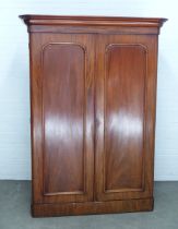 Victorian mahogany two door wardrobe, the interior with hanging space, pull out slides and drawers