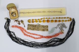 Vintage and later costume jewellery to include dress rings, coral coloured beads, bracelets and