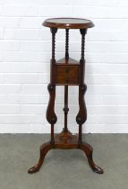 Reproduction stained hardwood wig stand of typical design, 44 x 88cm.