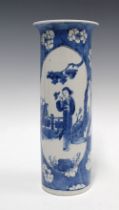 Chinese blue and white sleeve vase with a figural panel against a prunus ground, 30cm