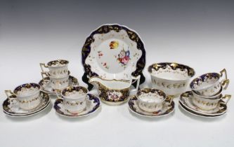 19th century English porcelain teaset with four tea cups and four coffee cups, eight saucers, slop