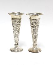 A pair of Art Nouveau silver vases by William Comyns, London 1906, 13.5cm (2)