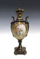 Sevres style porcelain urn vase with gilt metal surmounts, decorated with a figural panel against