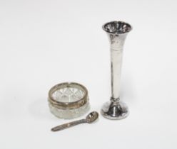 A small silver bud vase, 11cm high, a silver mounted glass salt and a Scandinavian silver