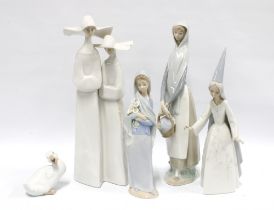 Four Lladro figures and a Nao figure (5)