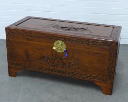 Chinese camphorwood carved chest/trunk, with stylised brass clasp fitting, 91 x 45 x 43cm.