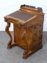 Victorian walnut and inlaid davenport, with four drawers on the right and faux drawers on the