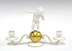 Hutschenreuther cherub candelabra, white glazed porcelain with gilt highlights, printed factory