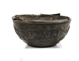 19th century carved coconut bowl with a white metal liner, (a/f) 13cm diameter