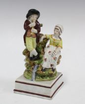 Staffordshire Rural Pastimes pearlware figure group, 9 x 18cm.