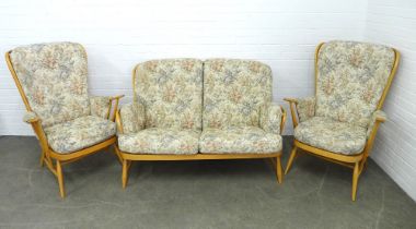 An Ercol light elm Windsor three piece suite, with loose cushions 142 x 83cm, chairs 74 x 104cm (3)
