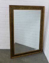 Rectangular wall mirror with bevelled edge plate, 76 x 107cm.